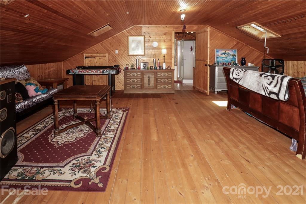 36 Maney Branch Road Weaverville, NC 28787 - Photo 27 of 42 a view of a chairs and table in a room