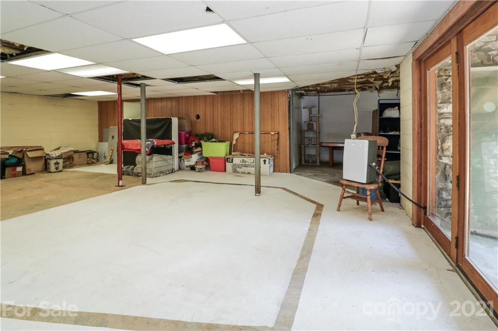 36 Maney Branch Road Weaverville, NC 28787 - Photo 33 of 42 a view of a room with gym equipment