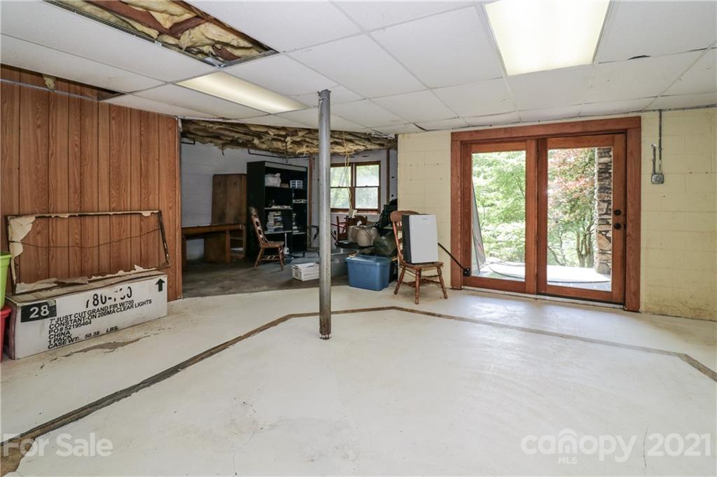 36 Maney Branch Road Weaverville, NC 28787 - Photo 34 of 42 a view of a livingroom with furniture and a window