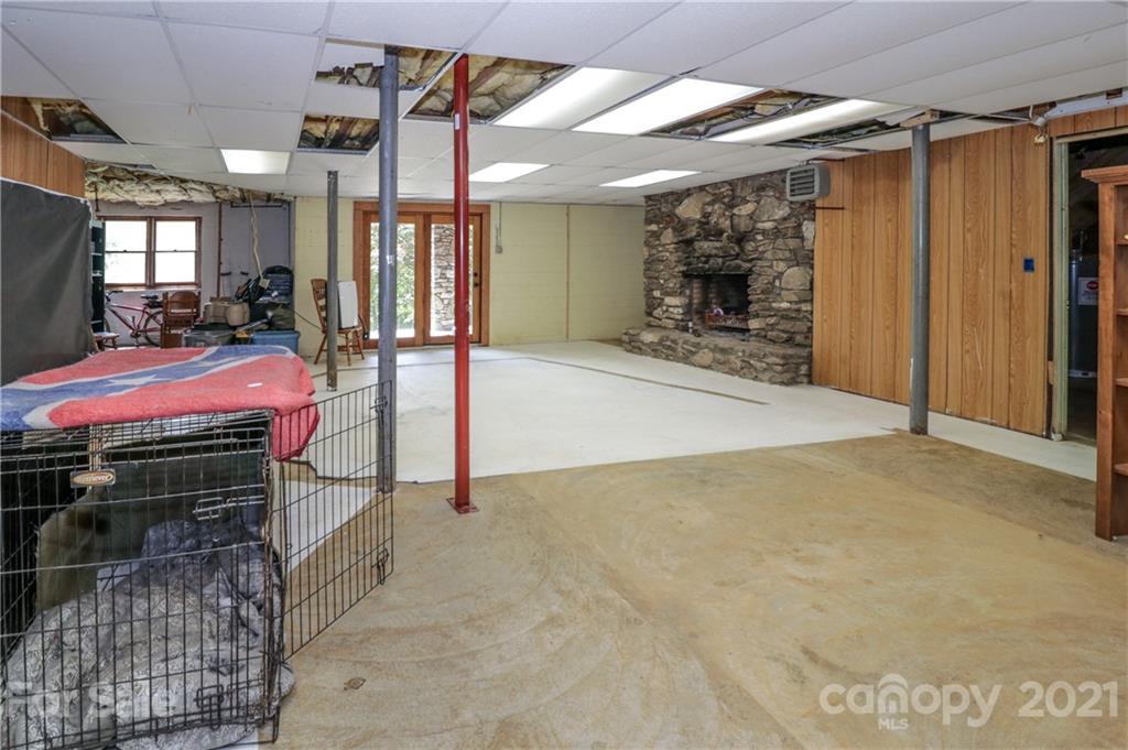 36 Maney Branch Road Weaverville, NC 28787 - Photo 36 of 42 a patio with table and chairs