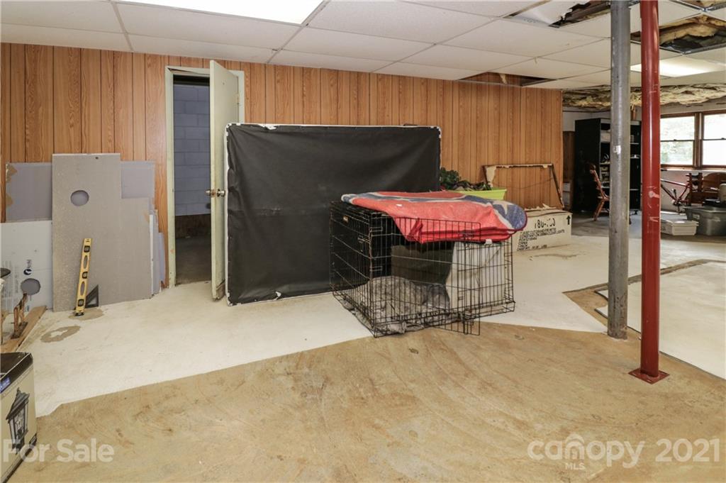 36 Maney Branch Road Weaverville, NC 28787 - Photo 37 of 42 a room with a table and chairs