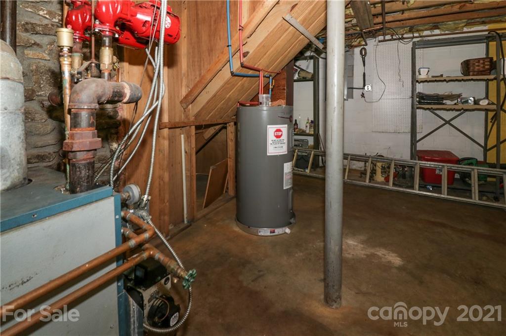 36 Maney Branch Road Weaverville, NC 28787 - Photo 38 of 42 a view of a room with gym equipment