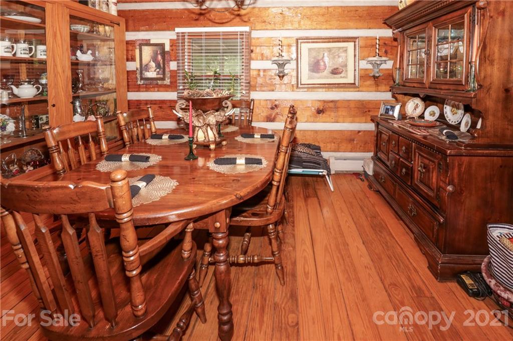 36 Maney Branch Road Weaverville, NC 28787 - Photo 5 of 42 a balcony with table and chairs