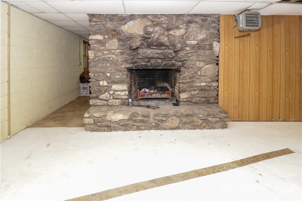 36 Maney Branch Road Weaverville, NC 28787 - Photo 41 of 42 a view of a fireplace in the room
