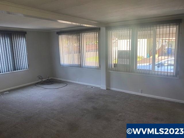 4940 Sunnyside Road Southeast, Unit F3 Salem, OR 97302 - Photo 2 of 18 a view of an empty room with a window