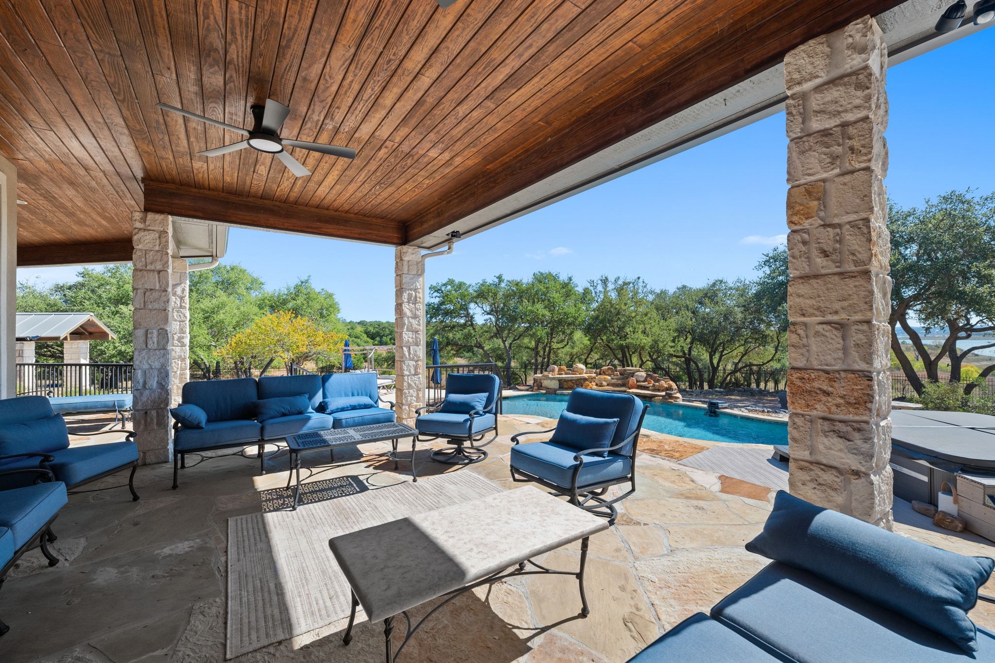 185 Shimmering Shore Court Spring Branch, TX 78070 - Photo 28 of 36 View of patio / terrace with a ceiling fan, an outdoor pool, an outdoor living space, and a hot tub
