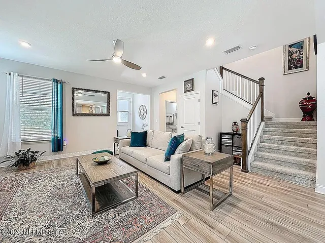 a kitchen with stainless steel appliances granite countertop a sink stove oven and refrigerator