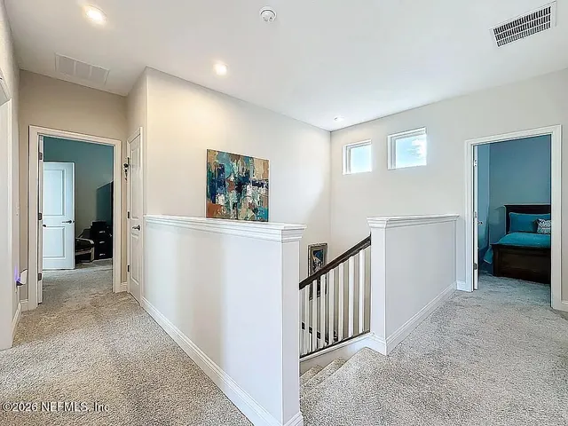 a bathroom with a shower and toilet