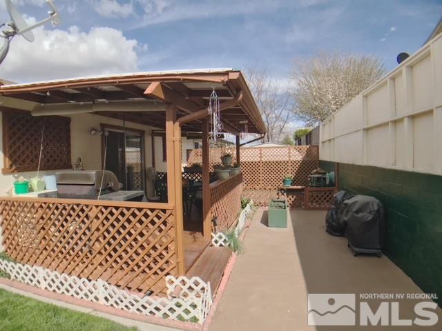 6570 Lotus Street Reno, NV 89506 - Photo 10 of 10 a view of a chairs and table in backyard