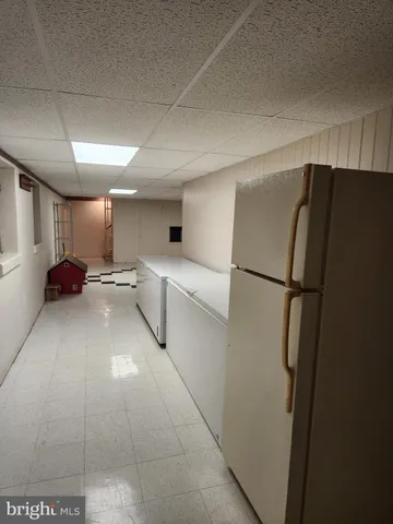 a living room with furniture window and wooden floor