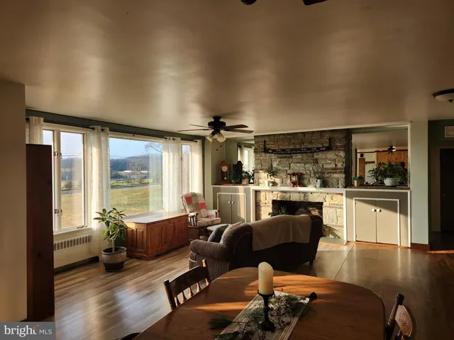 a balcony with a table and chairs