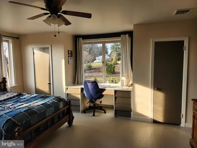 a view of a house with a roof deck