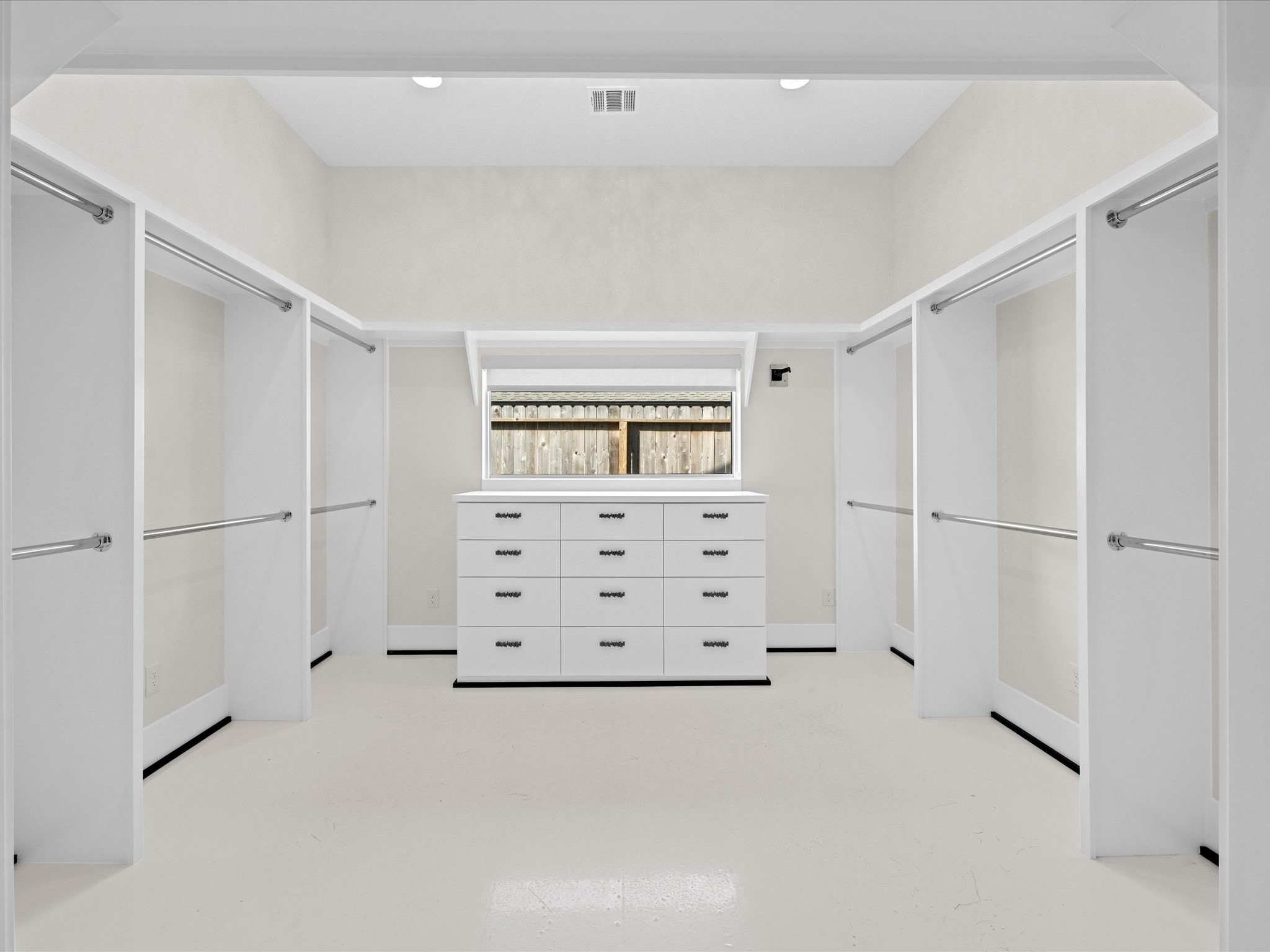 5603 Grape Street Houston, TX 77096 - Photo 21 of 40 a view of walk in closet with white walls