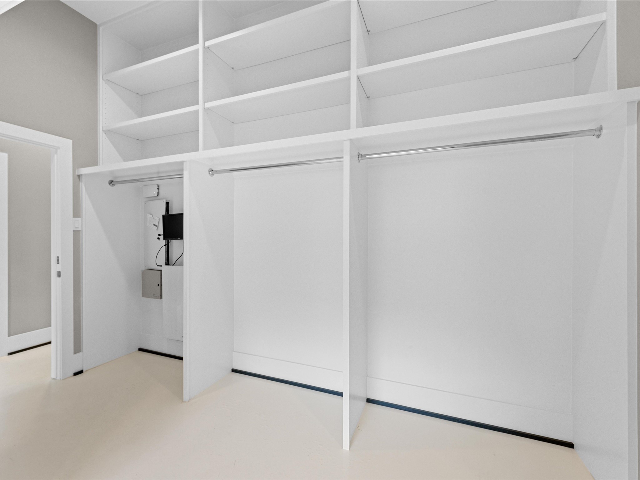 5603 Grape Street Houston, TX 77096 - Photo 22 of 40 a view of an empty walk in closet