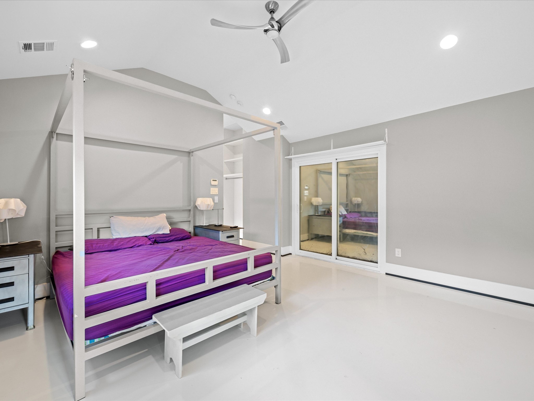 5603 Grape Street Houston, TX 77096 - Photo 24 of 40 a bedroom with a bed and a window