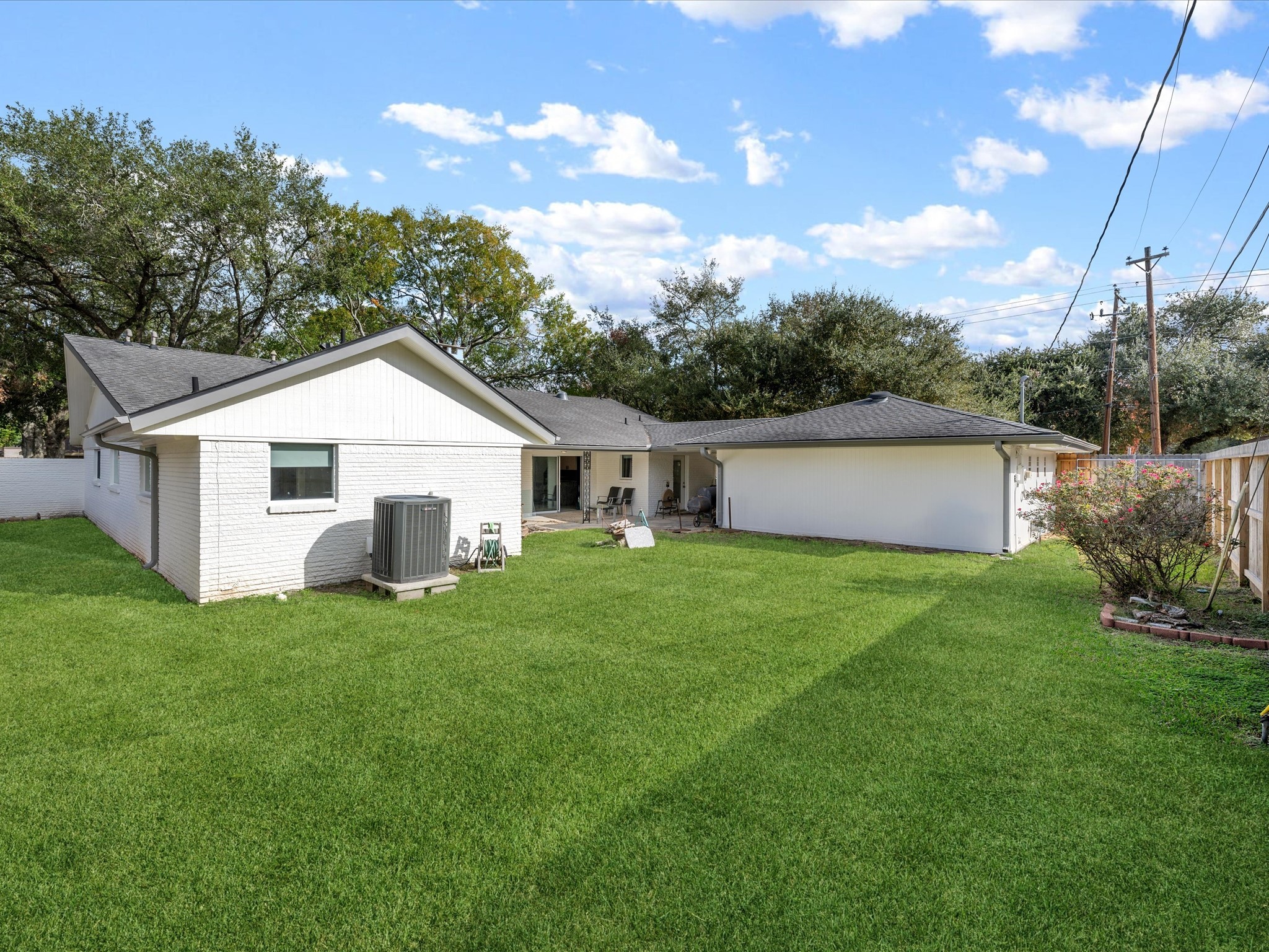 5603 Grape Street Houston, TX 77096 - Photo 32 of 40 a view of a house with a yard