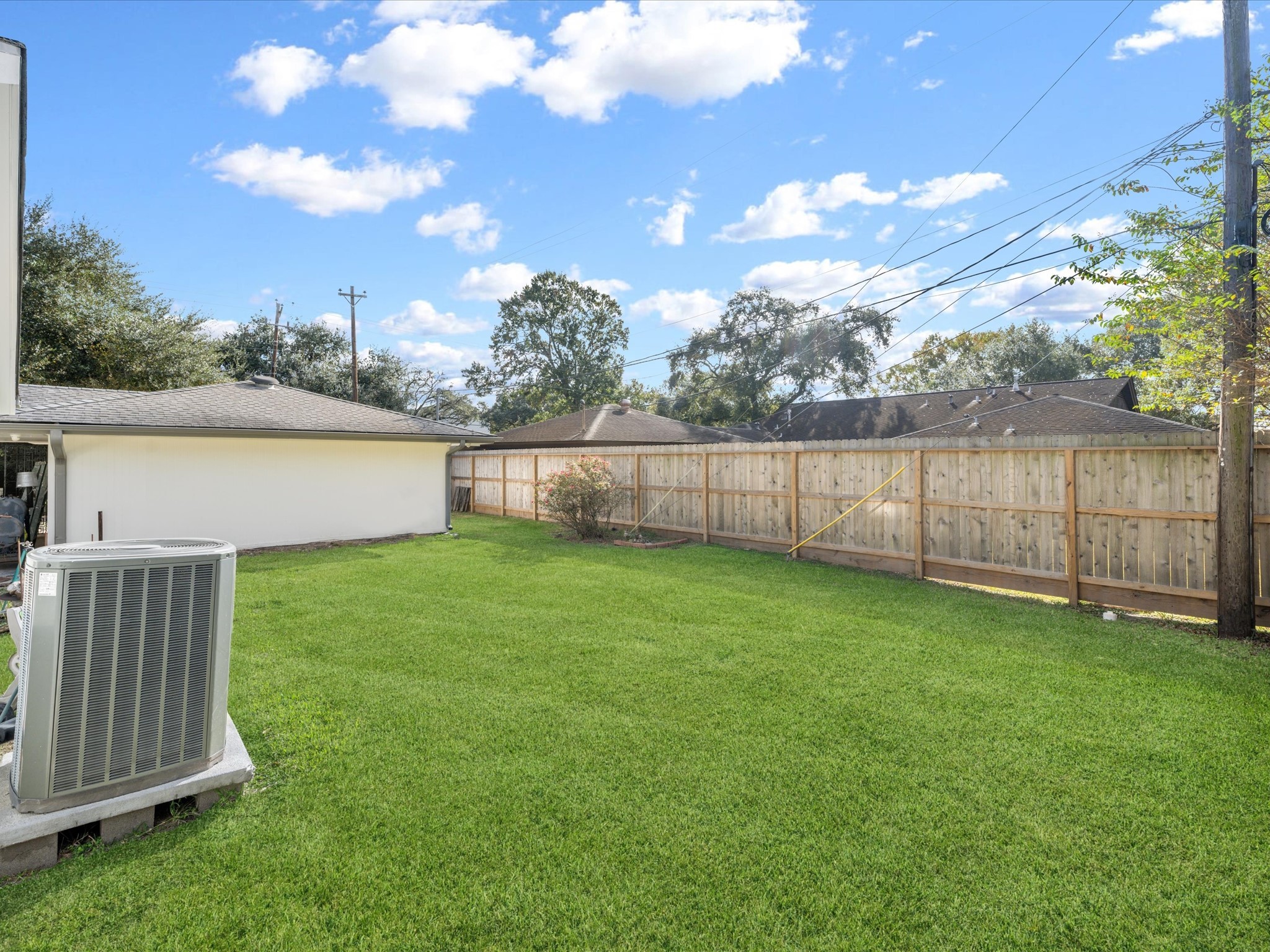 5603 Grape Street Houston, TX 77096 - Photo 33 of 40 a view of a backyard with a garden
