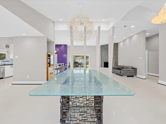 a view of a living room and kitchen