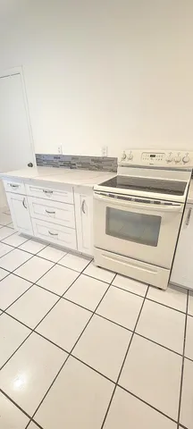 a view of a refrigerator and window