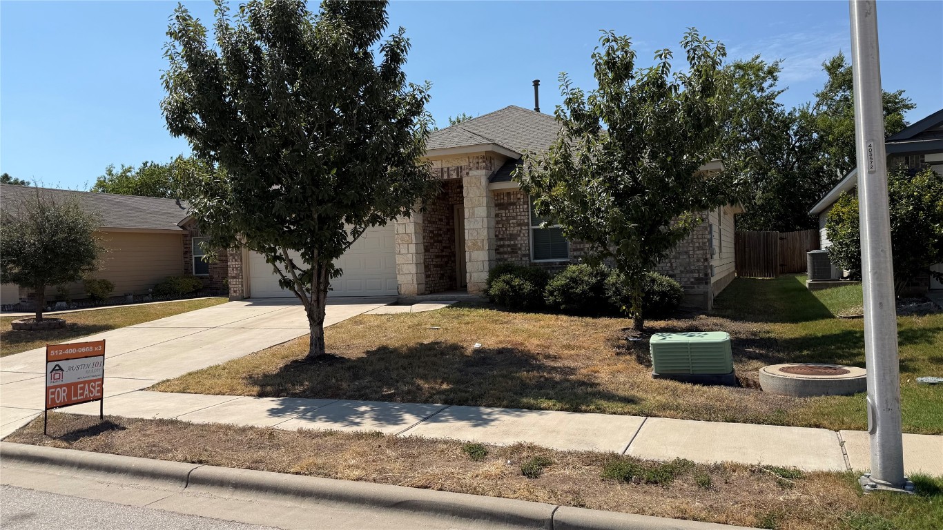 804 Red Tails Drive Austin, TX 78725 - Photo 2 of 14 a street sign on the side of a road