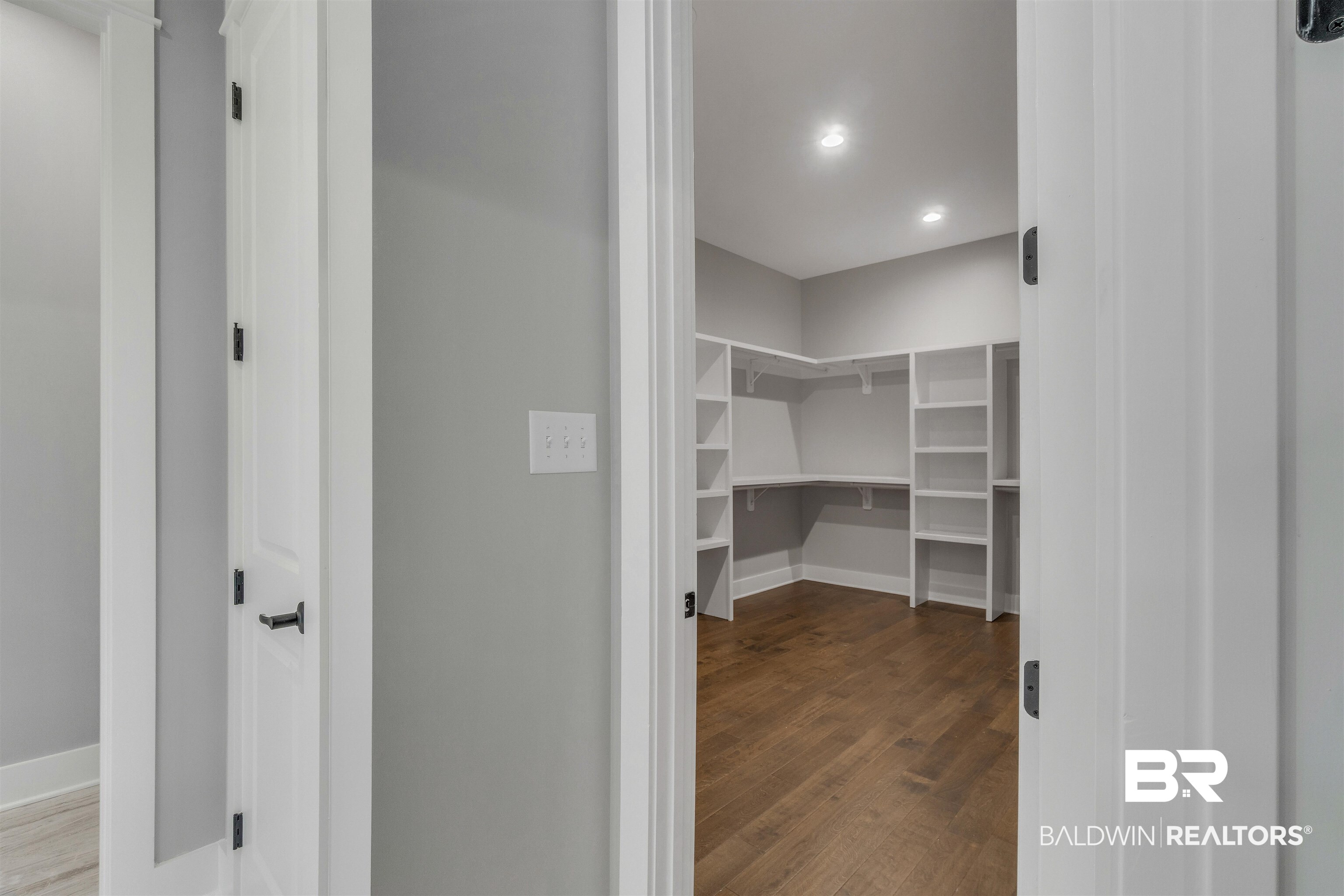 10985 Atrium Avenue Fairhope, AL 36532 - Photo 22 of 58 Spacious closet featuring dark wood-style floors