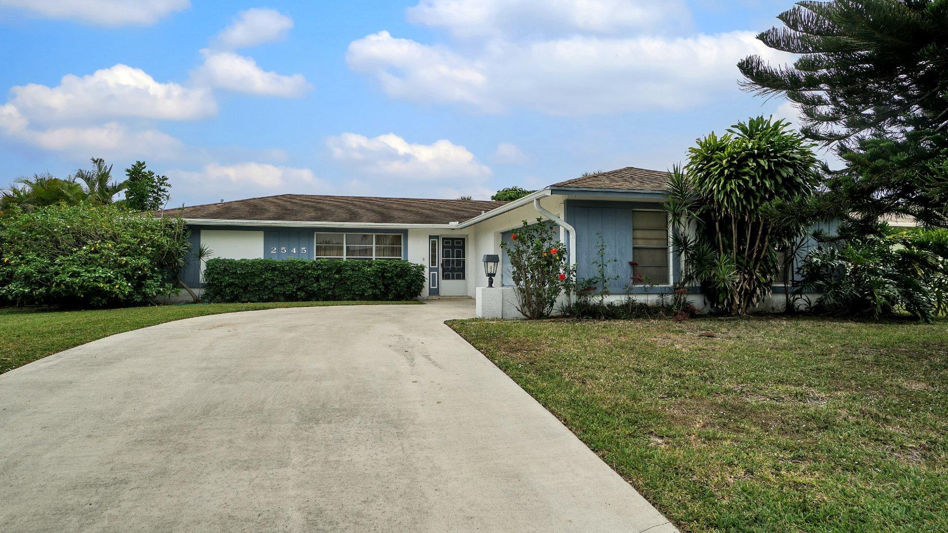 2545 Inisbrook Road Riviera Beach, FL 33407 - Photo 1 of 19 11750-DSC02736-5864a402