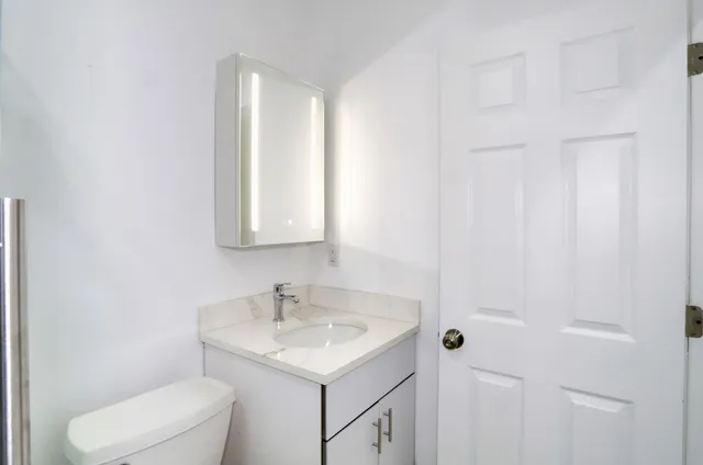 a picture of floor with a rug