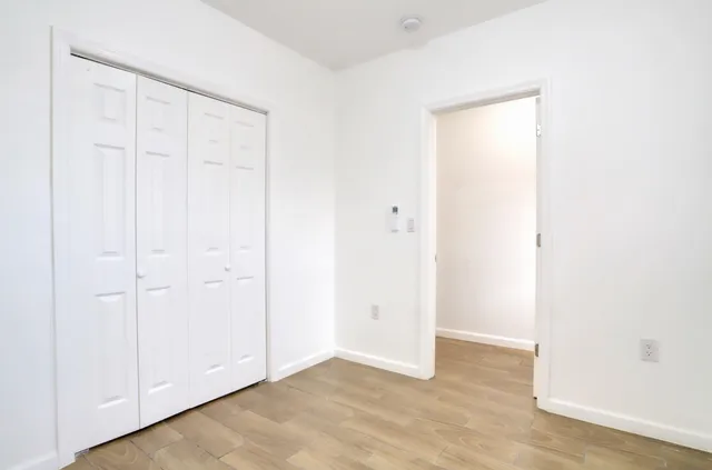 a bathroom with a shower and a toilet