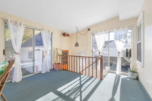 a view of livingroom with furniture and windows