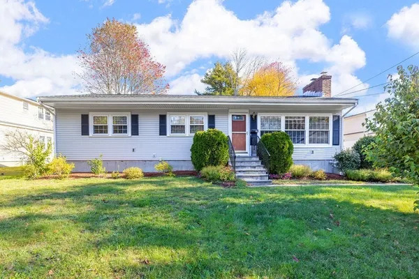 a house that has a big yard and more windows