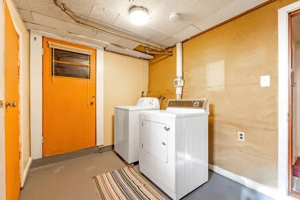 a view of empty room with ceiling fan
