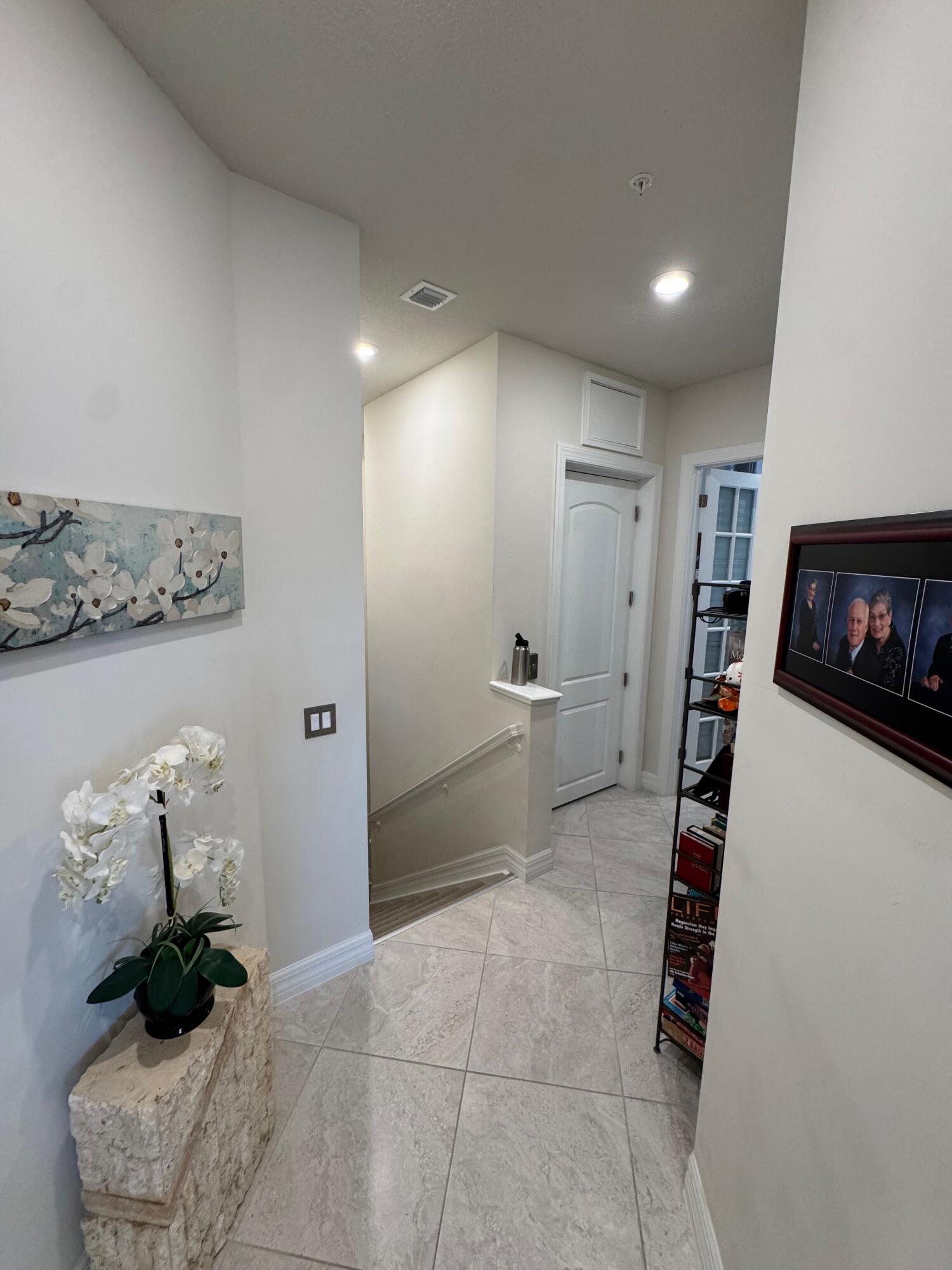 21872 Canadensis Circle, Unit 202 Boca Raton, FL 33428 - Photo 12 of 43 second floor landing