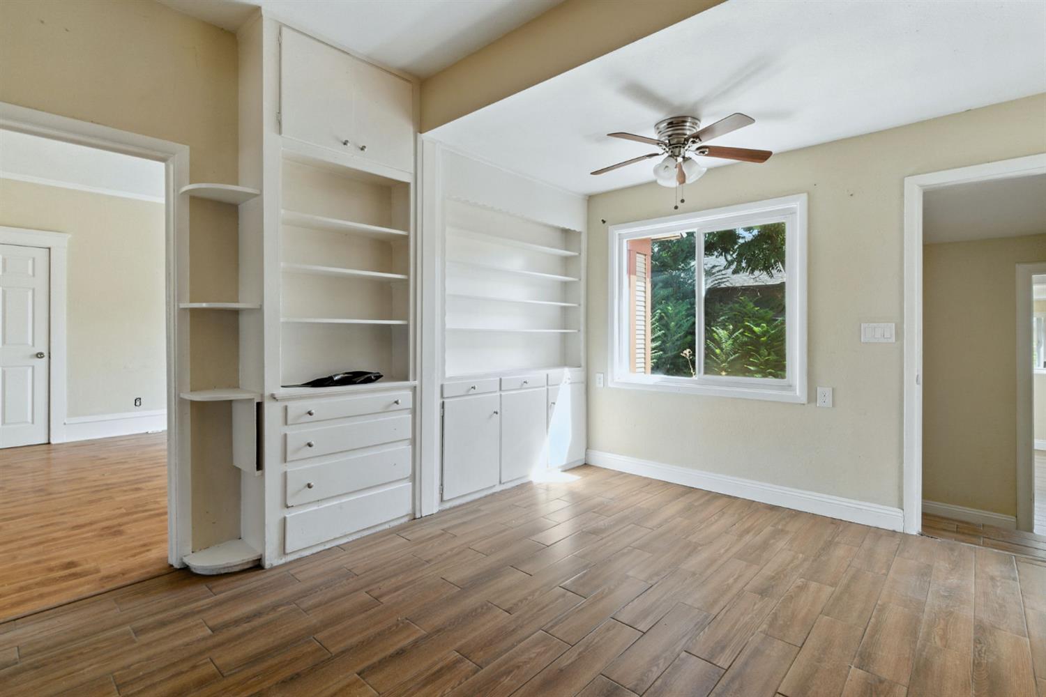312 West Main Street Turlock, CA 95380 - Photo 27 of 84 a view of a workspace with furniture and window