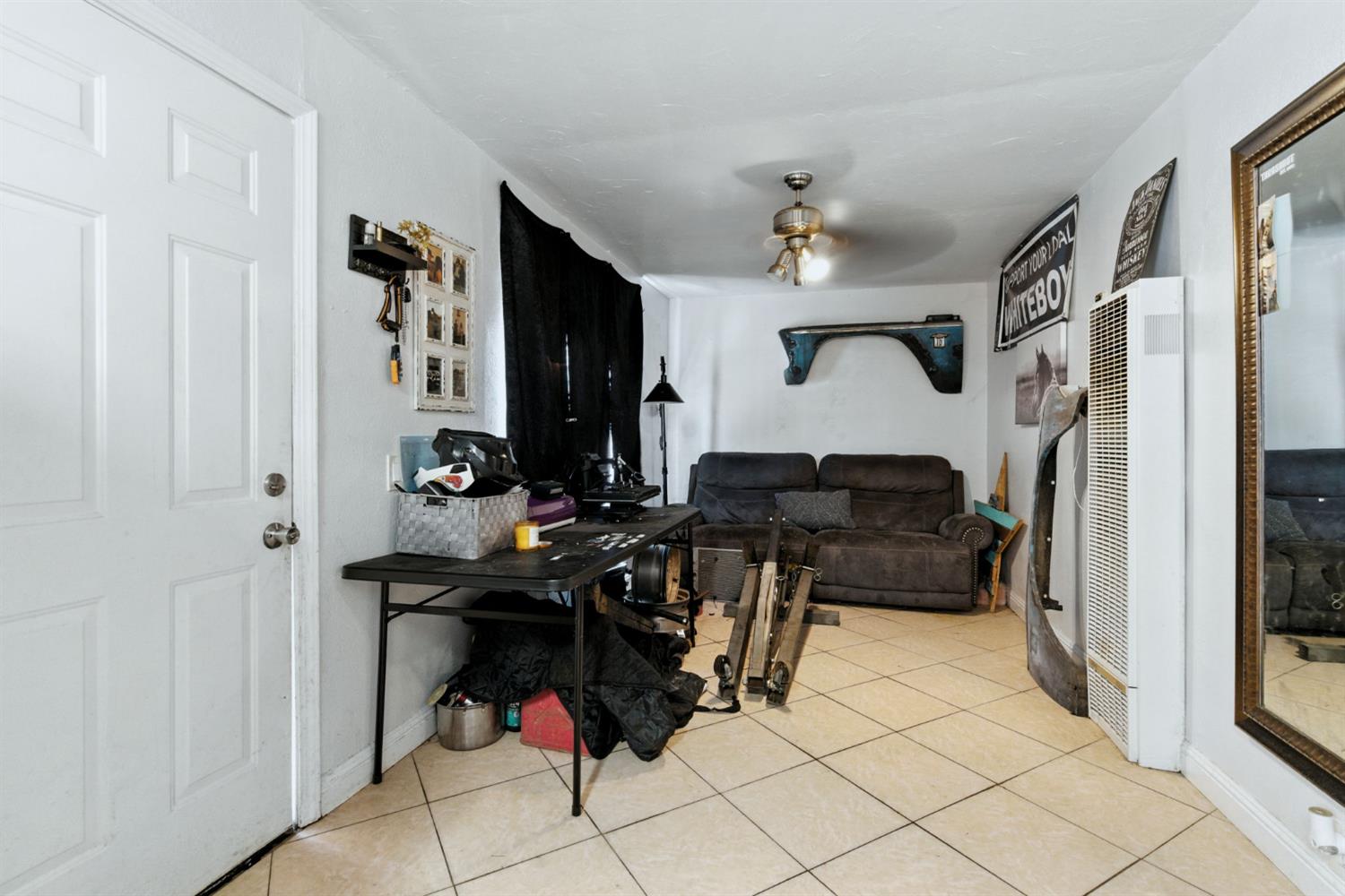 312 West Main Street Turlock, CA 95380 - Photo 50 of 84 a view of a entryway with workspace and a window