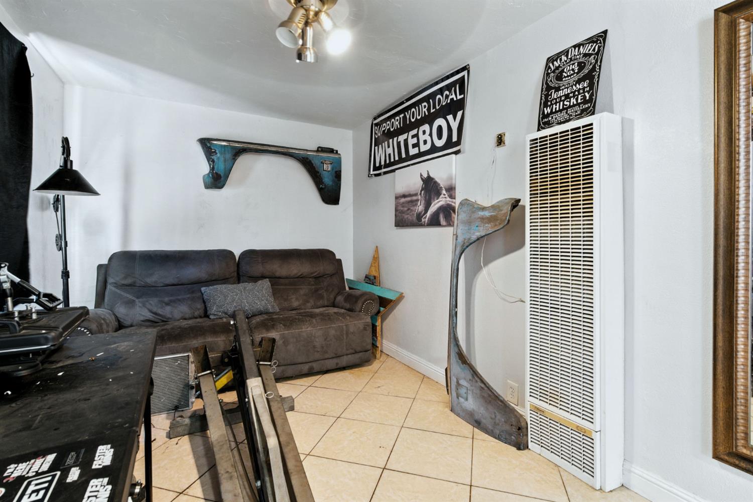 312 West Main Street Turlock, CA 95380 - Photo 52 of 84 a living room with furniture and a floor to ceiling window
