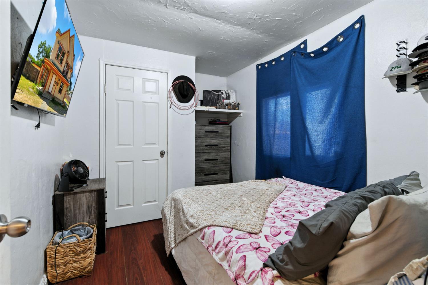 312 West Main Street Turlock, CA 95380 - Photo 59 of 84 a bedroom with a bed and a dresser