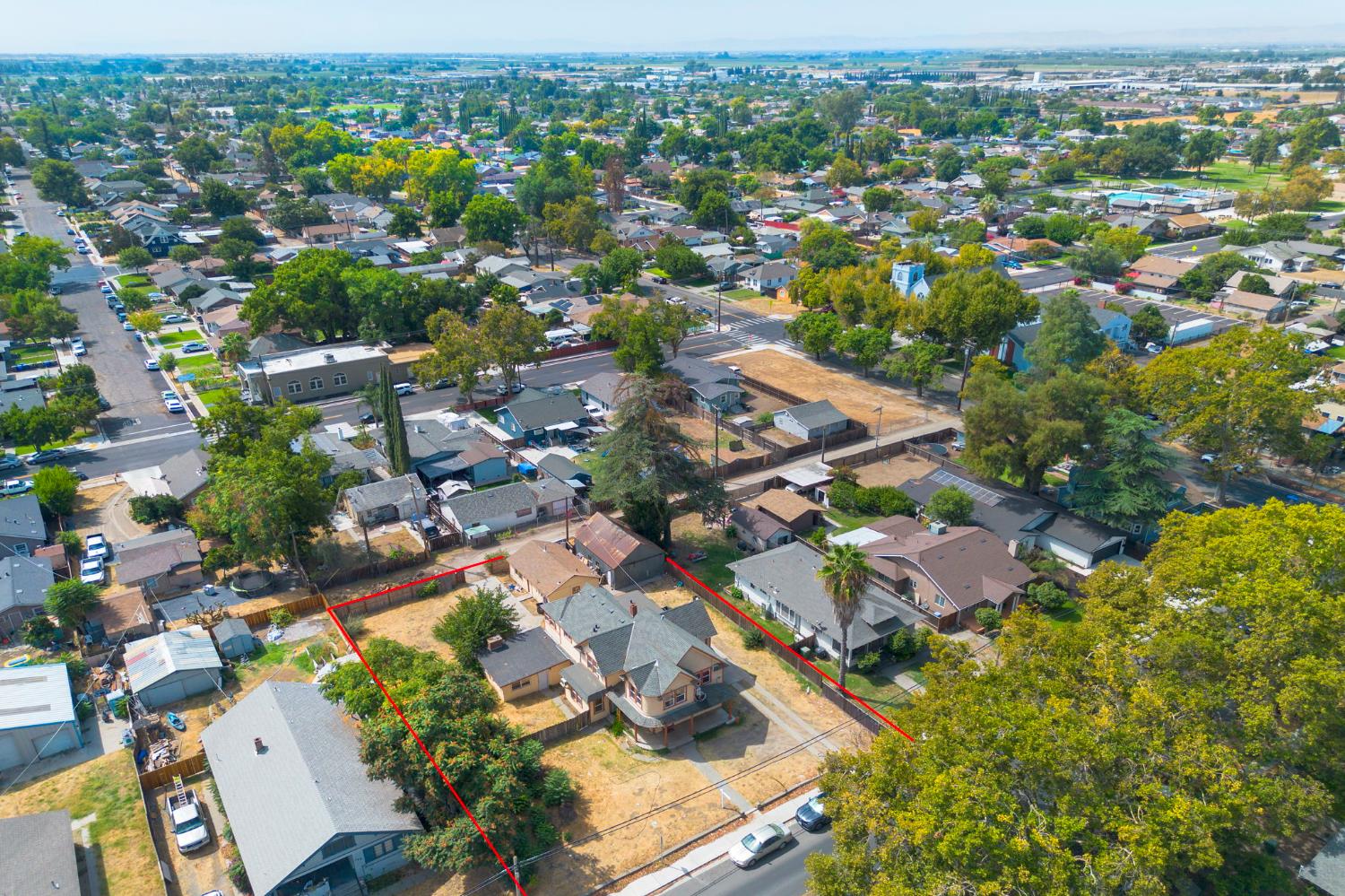 312 West Main Street Turlock, CA 95380 - Photo 69 of 84 an aerial view of residential houses with outdoor space