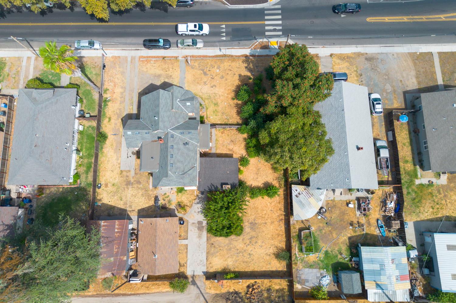312 West Main Street Turlock, CA 95380 - Photo 72 of 84 an aerial view of a house with a yard and large tree