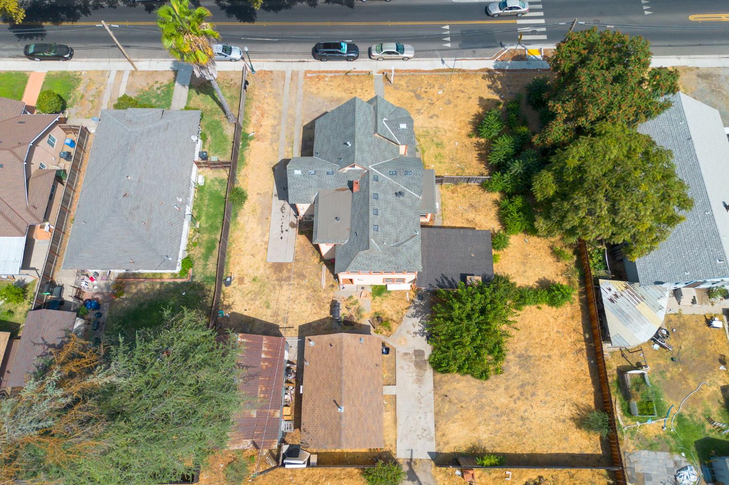 312 West Main Street Turlock, CA 95380 - Photo 77 of 84 an aerial view of residential houses with outdoor space