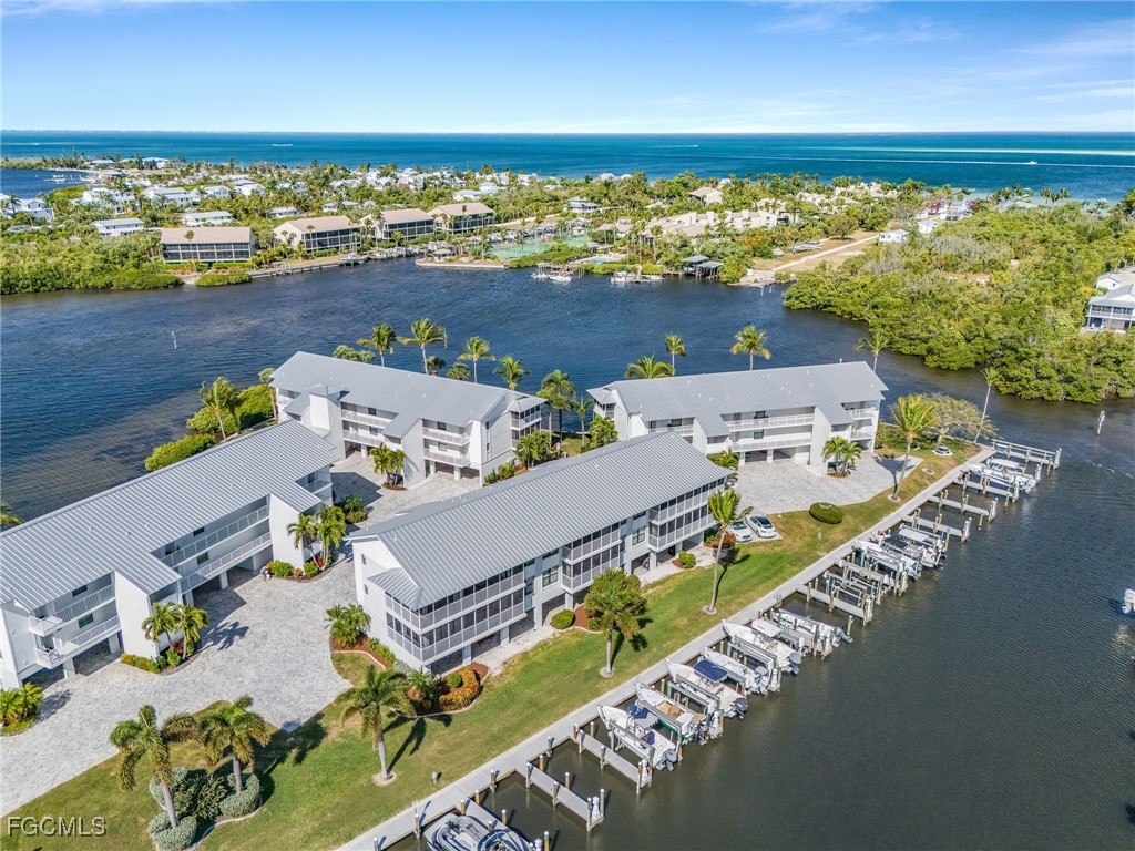 16641 Stringfellow Road, Unit 506 Bokeelia, FL 33922 - Photo 30 of 43 an aerial view of a house with a ocean view