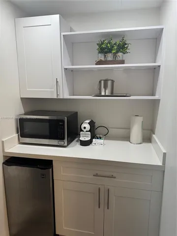 a view of white cabinets