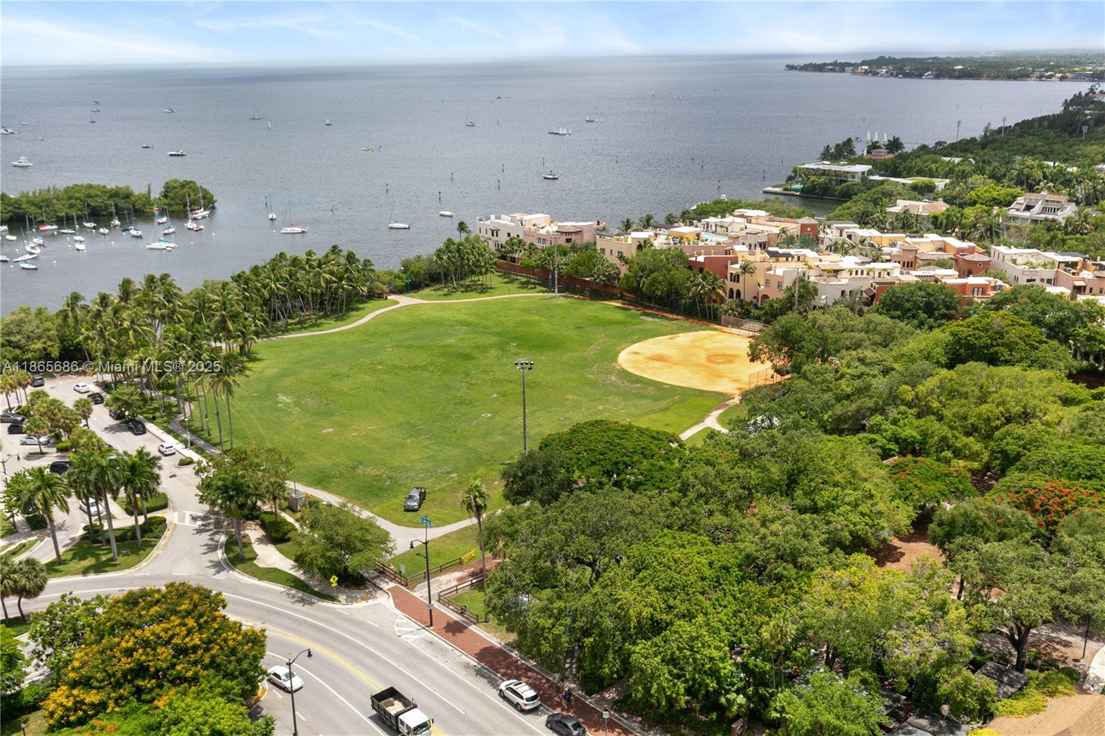 2889 McFarlane Road, Unit 1406 Miami, FL 33133 - Photo 5 of 23 an aerial view of a residential houses with outdoor space