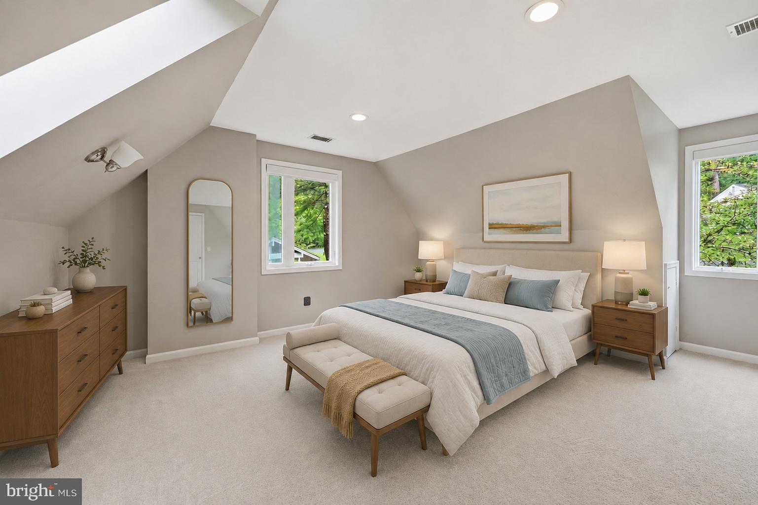 2506 Pinoak Lane Reston, VA 20191 - Photo 14 of 33 a spacious bedroom with a bed and a chandelier