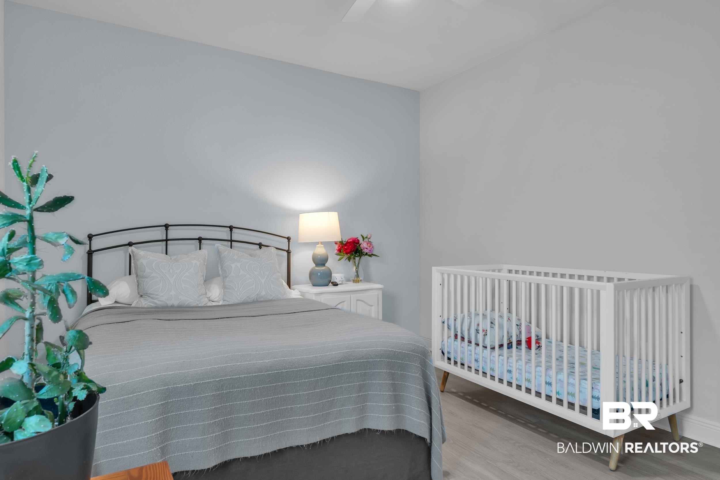 8774 Primland Boulevard Foley, AL 36535 - Photo 35 of 49 Bedroom featuring wood finished floors and a ceiling fan