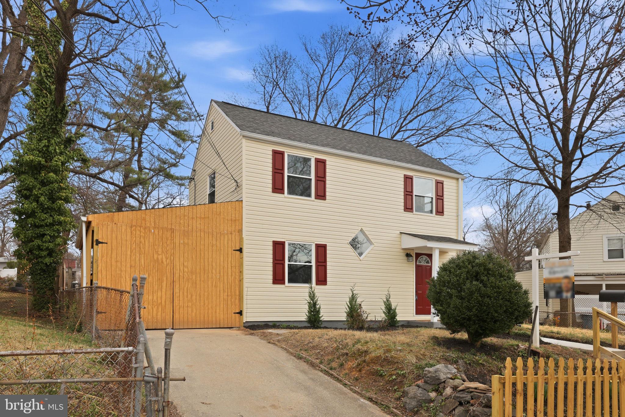 2403 Greeley Place Landover, MD 20785 - Photo 1 of 39 a view of a house with a yard