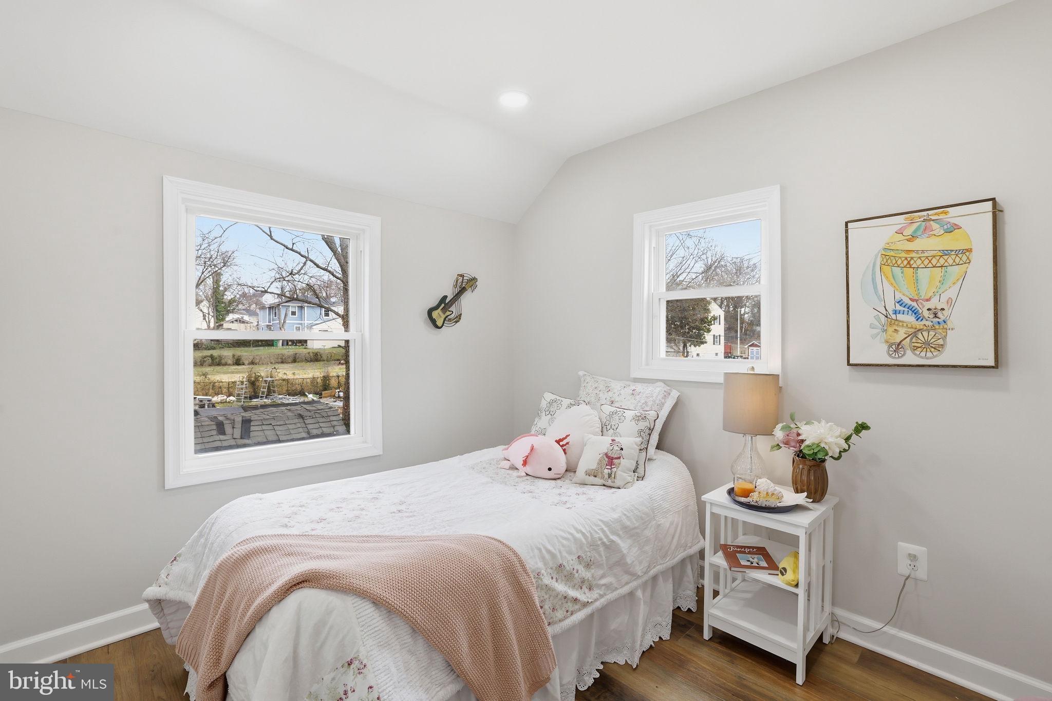 2403 Greeley Place Landover, MD 20785 - Photo 21 of 39 a bedroom with a bed and a window