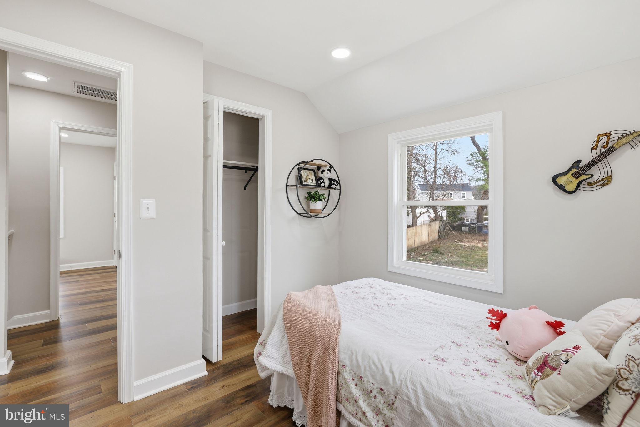 2403 Greeley Place Landover, MD 20785 - Photo 22 of 39 a bedroom with a bed and a window