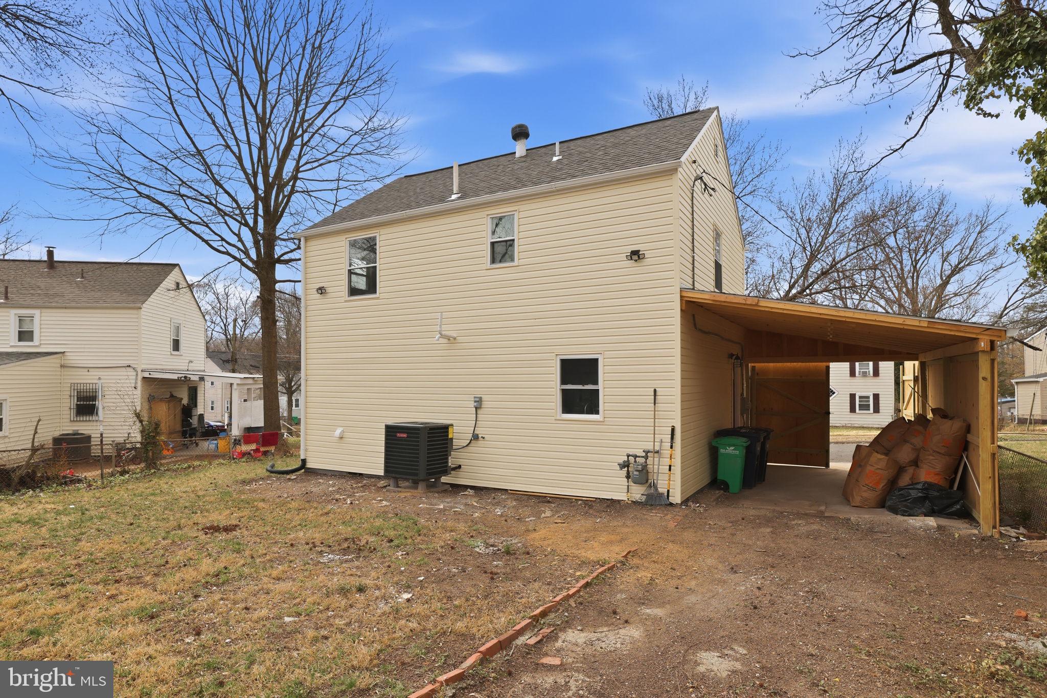 2403 Greeley Place Landover, MD 20785 - Photo 31 of 39 a view of a white house with a large space
