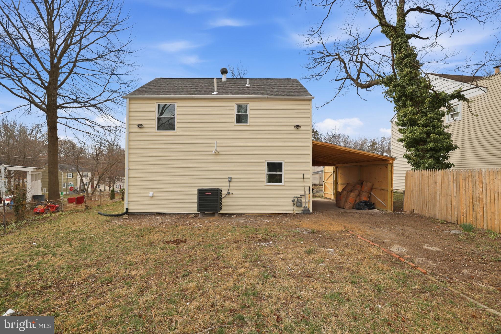 2403 Greeley Place Landover, MD 20785 - Photo 33 of 39 a view of a house with a yard