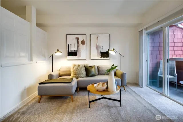 a living room with furniture and a window